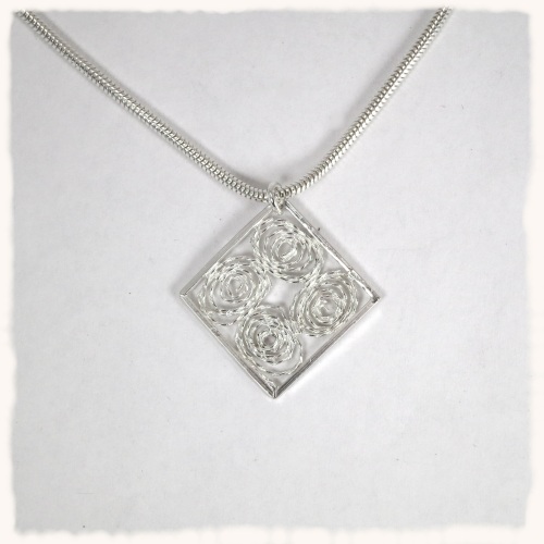 Diamond shaped silver filigree pendant